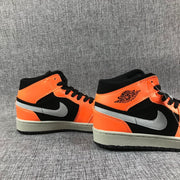 Air Jordan 1 Mid Sneakers in Black, Orange and Grey 554724-062