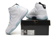 Jordan Air Jordan 11 Retro High-Top Sneakers White and Blue