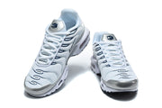 Nike Air Max Plus Sneakers in White and Metallic Silver