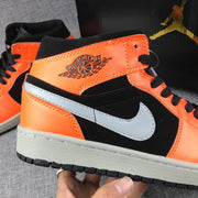 Air Jordan 1 Mid Sneakers in Black, Orange and Grey 554724-062