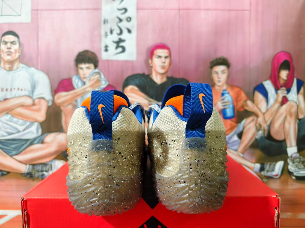 Nike Beige Basketball Sneakers with Orange and Blue Details