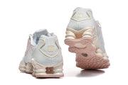 Nike Shox TL Sneakers in White and Pink