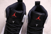Jordan Air Jordan 12 Reverse Taxi Sneakers Black White 130690-001