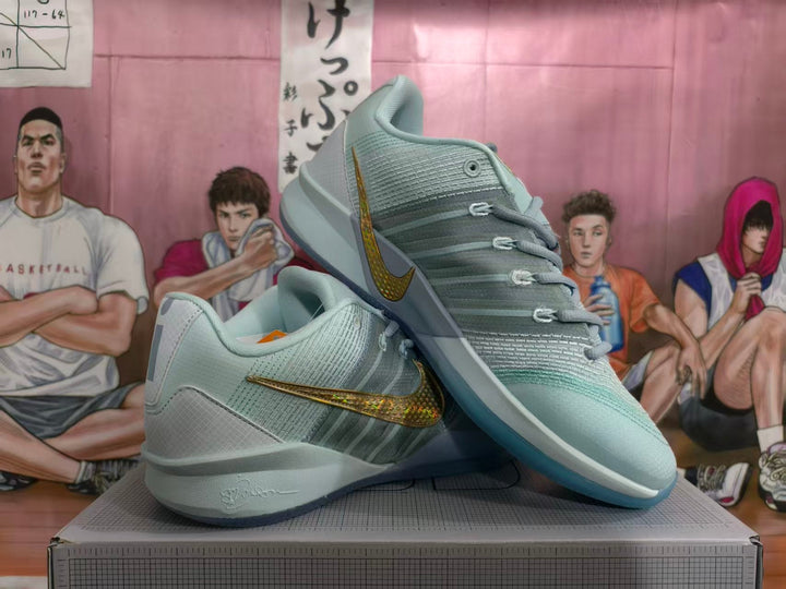 Nike Basketball Shoes in Blue with Gold Swoosh