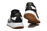 Prada Black and White Logo Low-Top Sneakers