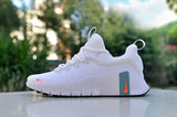 Nike White Low-Top Sneakers with Teal and Coral Accents
