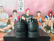 Nike Black Low-Top Sneakers with Metallic Swoosh