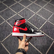 Jordan 1 High Black Red Patent Leather Sneakers