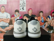 White and Black Low-Top Sneakers
