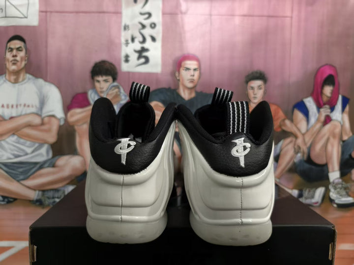 White and Black High-Top Basketball Sneakers