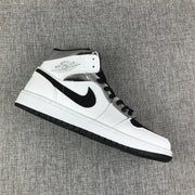 Jordan Air Jordan 1 Mid White Black Metallic Silver Sneakers