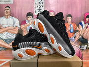 Nike Black Sneakers with Orange Accents