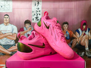 Nike Pink Basketball Sneakers with Metallic Gold Accents