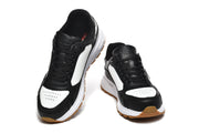 Prada Black and White Low-Top Sneakers with Gum Sole