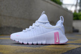 Nike Free Sneakers in White and Pink