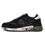 Black and White Low-Top Sneakers with Graphic Sole