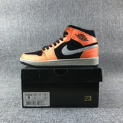Air Jordan 1 Mid Sneakers in Black, Orange and Grey 554724-062