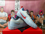Nike White and Blue Basketball Sneakers with Red Accents