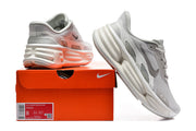 Nike Motiva Comfort Ride Easy-On Sneakers in Light Grey