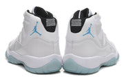 Jordan Air Jordan 11 Retro High-Top Sneakers White and Blue