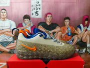 Nike Beige Basketball Sneakers with Orange and Blue Details