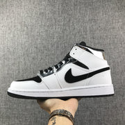 Jordan Air Jordan 1 Mid White Black Metallic Silver Sneakers
