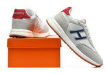 Hermès Grey and White Low-Top Sneakers with Blue Accents