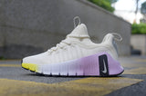 Nike Free Sneakers in White and Purple