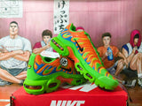Nike Air Max Plus Sneakers in Orange and Green