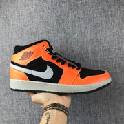 Air Jordan 1 Mid Sneakers in Black, Orange and Grey 554724-062
