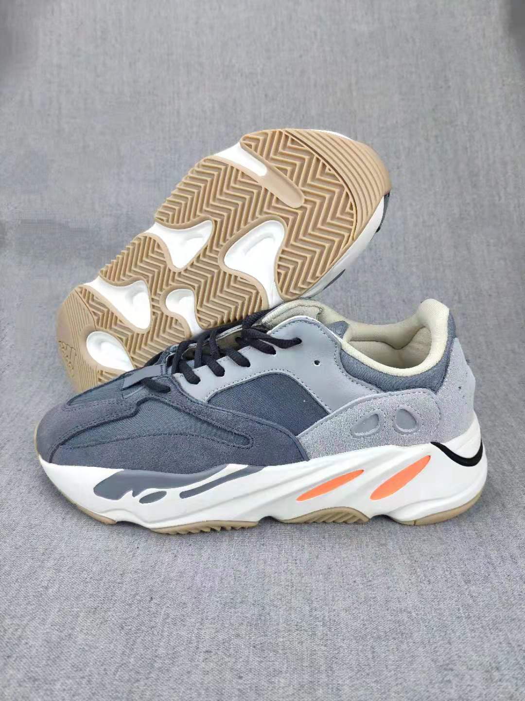 700 Grey Lifestyle Sneakers with Orange Accents