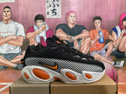 Nike Black Sneakers with Orange Accents